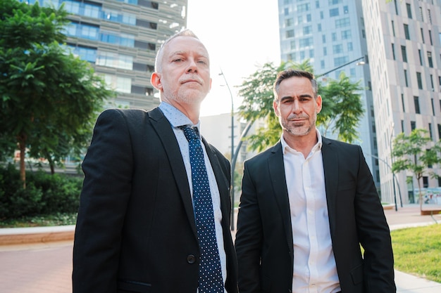 two mature experienced business executives engaged thoughtful strategic professional discourse 639864 2100